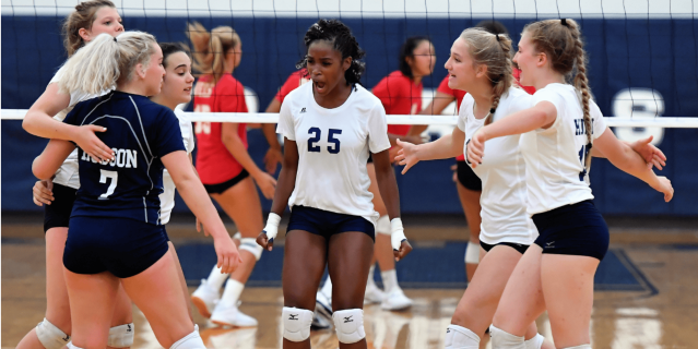 Volleyball team celebrating